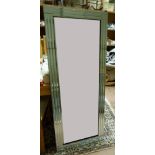 A Bevelled wall mirror with triple bevelled mirrored border with square corners, 150cm x 60cm