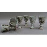 A set of six Denby pottery goblets, the tapered cylindrical bowls on knopped stems, 14cm high,