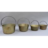 Four brass jam pans, two with fixed hoop handles the largest being 39cm high over handle and two