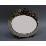 A Barbola oval mirror floral encrusted arch and ripple moulded oval frame with bevel plate, 26cm