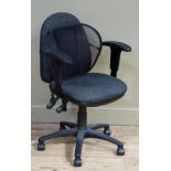 A black fabric office armchair on five star base
