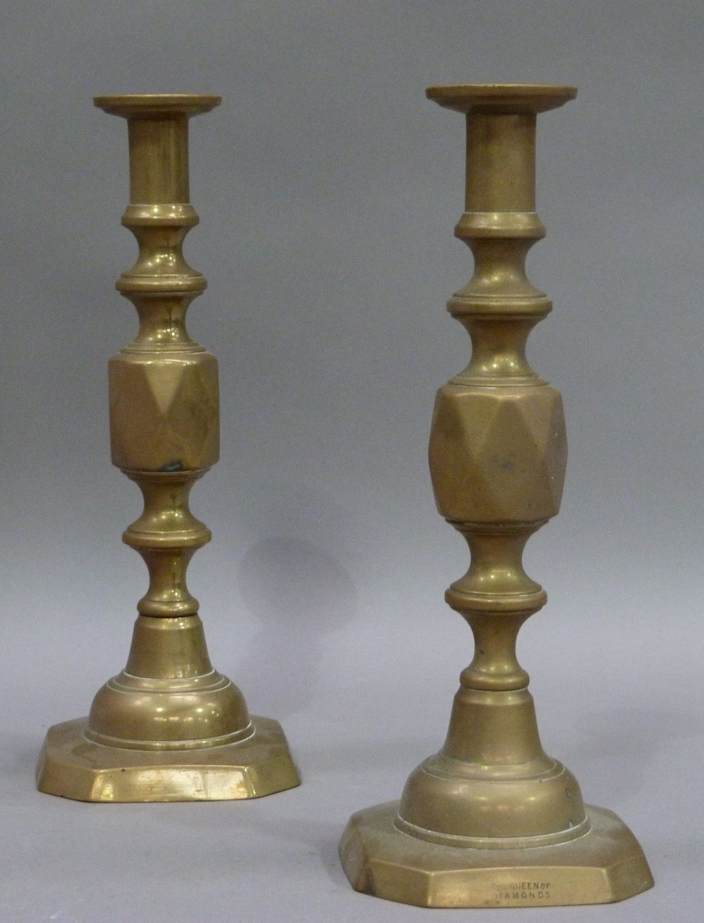 A pair of Victorian Queen of Diamonds brass table candlesticks, 29cm high - Image 2 of 3