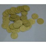 A quantity of George III brass gaming tokens