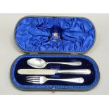 A silver christening set of Old English pattern with fine hammer textured handles by H A,
