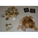 Approximately 80gm of mixed English and foreign silver coins, bag of pennies and halfpennies plus