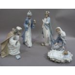 A group of five Nao figures, Mary, Christ child and the three wise men,various sizes