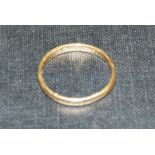 A wedding ring in yellow metal (tests as 22ct gold), approximate weight 2gm