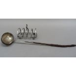 An Edwardian silver five bar toast rack with loop and on ball feet, Birmingham 1901; together a
