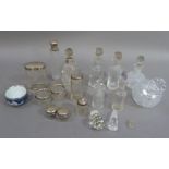 A quantity of silver topped jars and bottles, salts, etc, together with a small quantity of cut