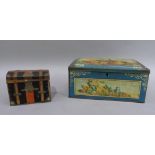 A Thormes printed tin plate biscuit tin with lock, 25cm wide; together with another biscuit tin