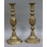 A pair of Victorian Queen of Diamonds brass table candlesticks, 29cm high