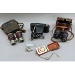 A pair of early 20th century night and day achromatic pair of field glasses in original case