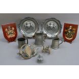 A model cannon and two armorial painted shields possibly for Huddersfield, a model cannon, a