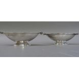 A pair of Art Deco pedestal bowls of boat shape with cylindrical ivorine silver mounted ivorine