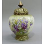 A Royal Vienna pot pourri vase and cover, the shaded green ground printed and enamelled with