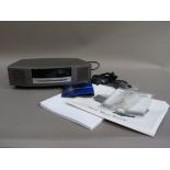 Bose wave CD music system with paperwork