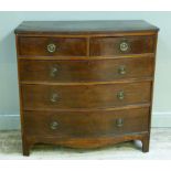 A post Regency mahogany bow fronted chest of two short and three long graduated, cockbeaded drawers,