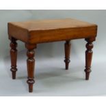 A mid Victorian mahogany bidet the rectangular figured pull off cover revealing pottery liner,