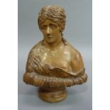 A treen bust of Clytie, early 20th century, after the antique, modelled as a girl emerging from a