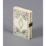 AN 18TH CENTURY IVORY PILL BOX IN THE FORM OF A BOOK, the spine engraved and blackened with four