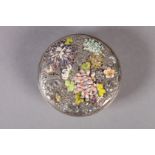 A JAPANESE SILVER AND ENAMEL CIRCULAR BOX AND COVER, the pull-off lid finely relief cast with