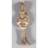 AN EGYPTIAN CLAY USHABTI possibly Osiris with arms crossed, carrying crook and flail wearing the