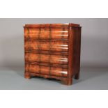 A MID 19TH CENTURY BIEDERMEIER FIGURED MAHOGANY CHEST OF FOUR SERPENTINE FRONTED DRAWERS, shaped