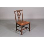 AN 18TH CENTURY MAHOGANY SINGLE CHAIR, having a serpentine top rail carved with leafage and