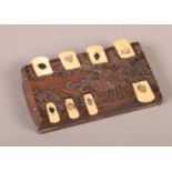 A JAPANESE COPPER AND IVORY WHIST MARKER, Meiji period, rectangular, cast with cranes amongst