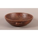 A THOMPSON OF KILBURN 'MOUSEMAN' ENGLISH OAK FRUIT BOWL, circular, carved in relief with a mouse,