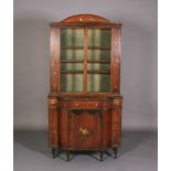 AN EARLY 20TH CENTURY PAINTED SATINWOOD BOOKCASE-CABINET, having an arched pediment painted with a