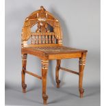 A FRENCH EGYPTIAN REVIVAL WALNUT CHAIR inlaid throughout with ivory, mother of pearl and coloured