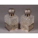 A PAIR OF EDWARD VII SILVER MOUNTED AND DIAMOND CUT GLASS COLOGNE BOTTLES, Sheffield 1902 by James