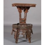 A LATE 19TH CENTURY SYRIAN REVOLVING OCCASIONAL TABLE, the square top relief carved and inlaid