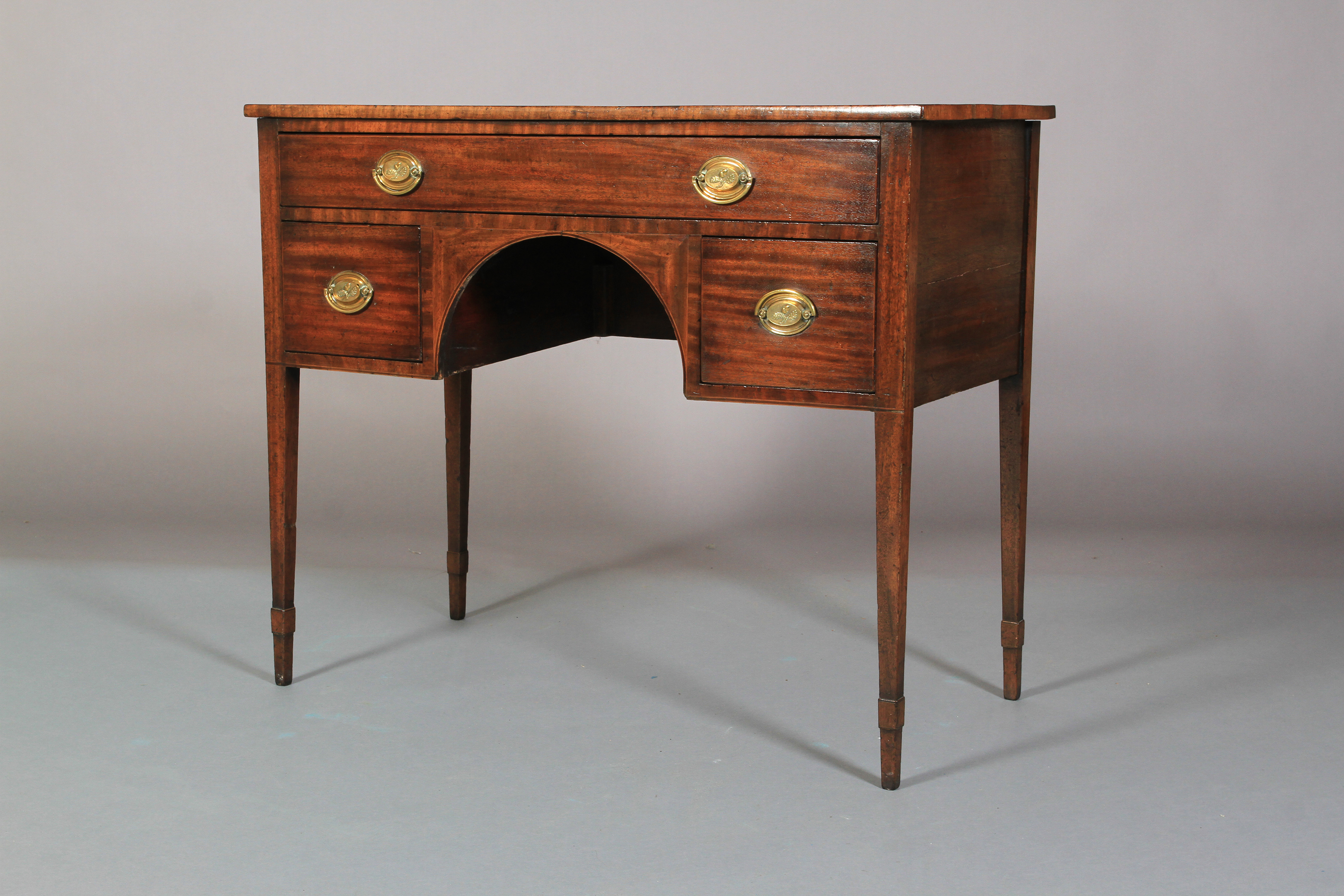 AN EARLY 19TH CENTURY MAHOGANY SIDE TABLE, having a drawer across above an arched apron flanked by a - Image 2 of 3