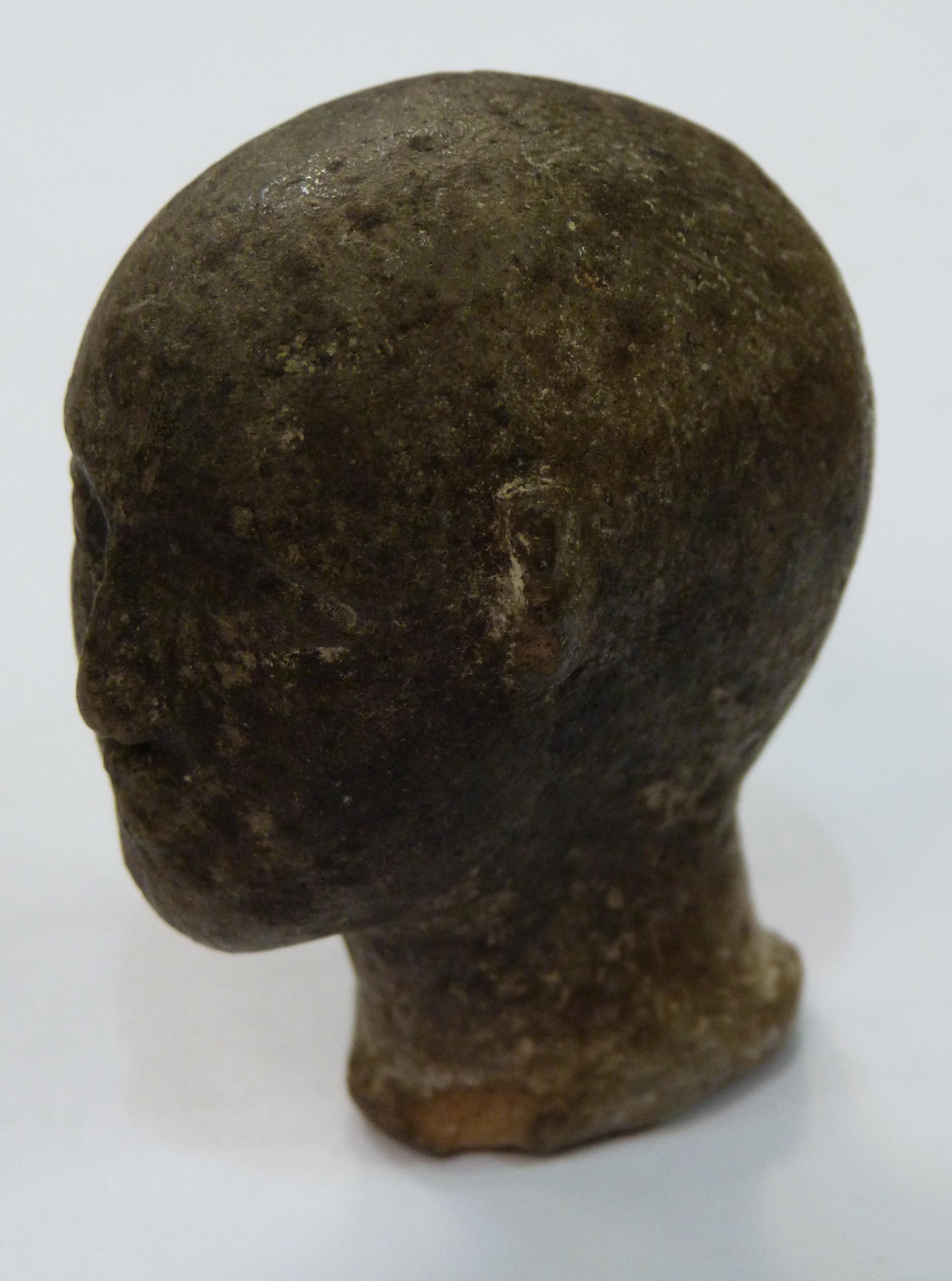 A SMALL POTTERY HEAD realistically modelled with bald pate, shallow oval neck, bearing traces of - Image 3 of 7