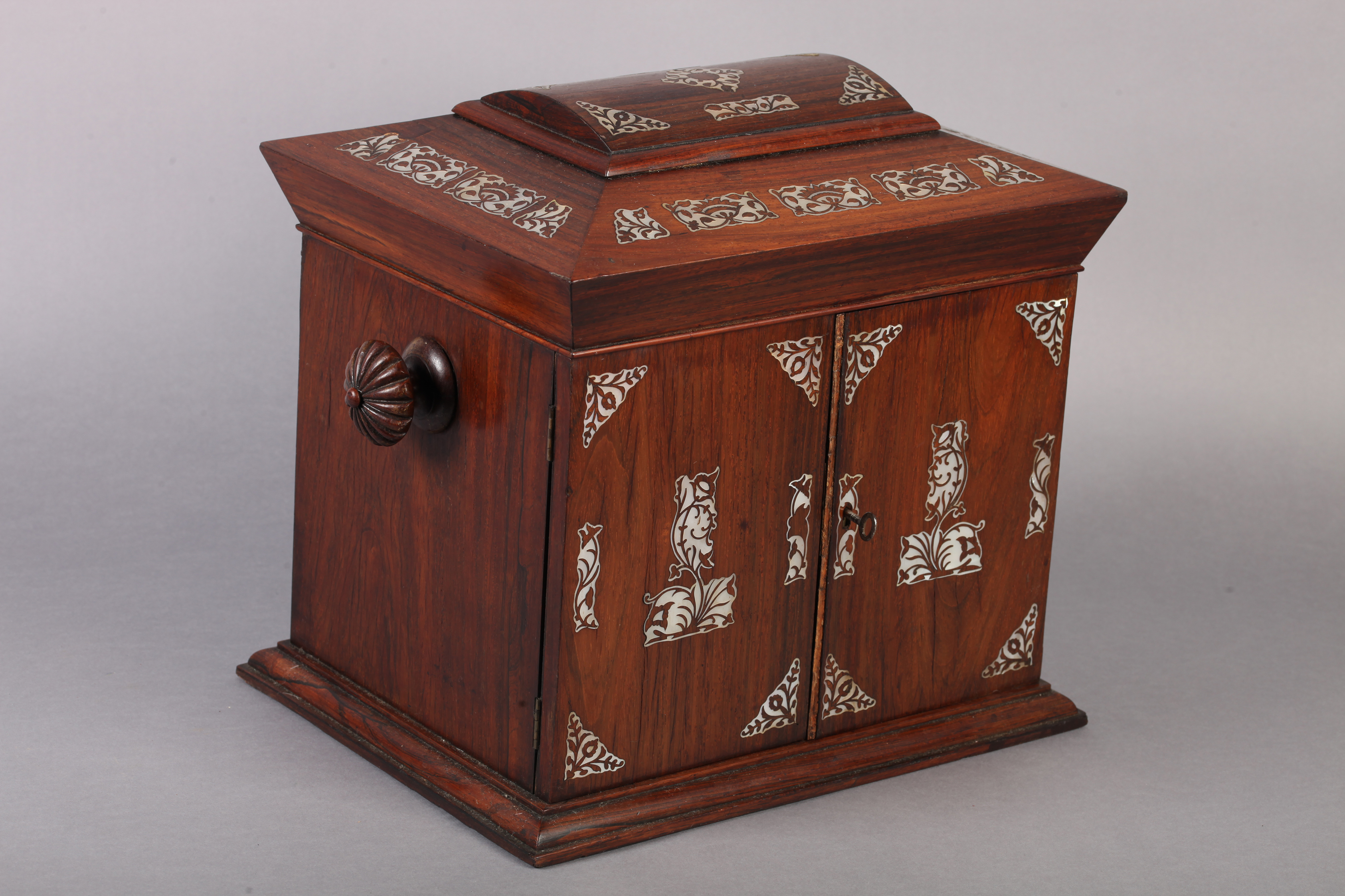 A VICTORIAN MOTHER OF PEARL INLAID ROSEWOOD TABLE CABINET with domed sarcophagus shaped hinged lid - Image 2 of 5