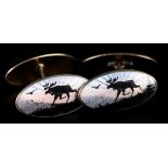 A PAIR OF NORWEGIAN SILVER GILT AND ENAMEL CUFFLINKS BY AKSEL HOLMSEN each oval face with a