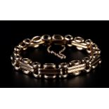 A VICTORIAN BRACELET in 15ct rose gold gate and fetter links, approximate weight 18gm