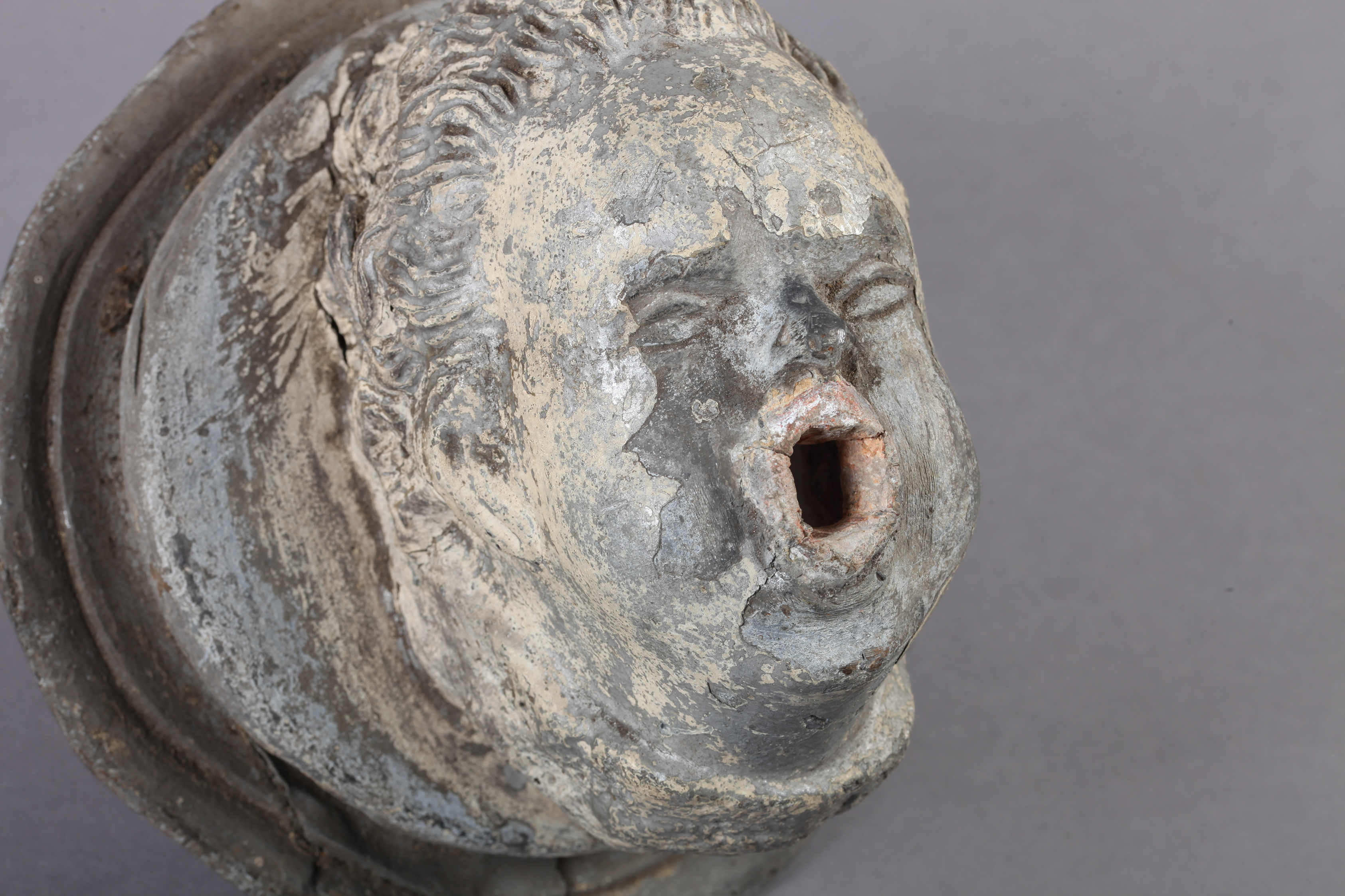 A 19TH CENTURY LEAD CHERUB FACE MASK FOUNTAIN HEAD, with defined features, puffed out cheeks blowing - Image 2 of 2