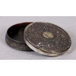 A CHINESE SILVER MOUNTED TORTOISESHELL CIRCULAR BOX and cover finely relief carved to the top,