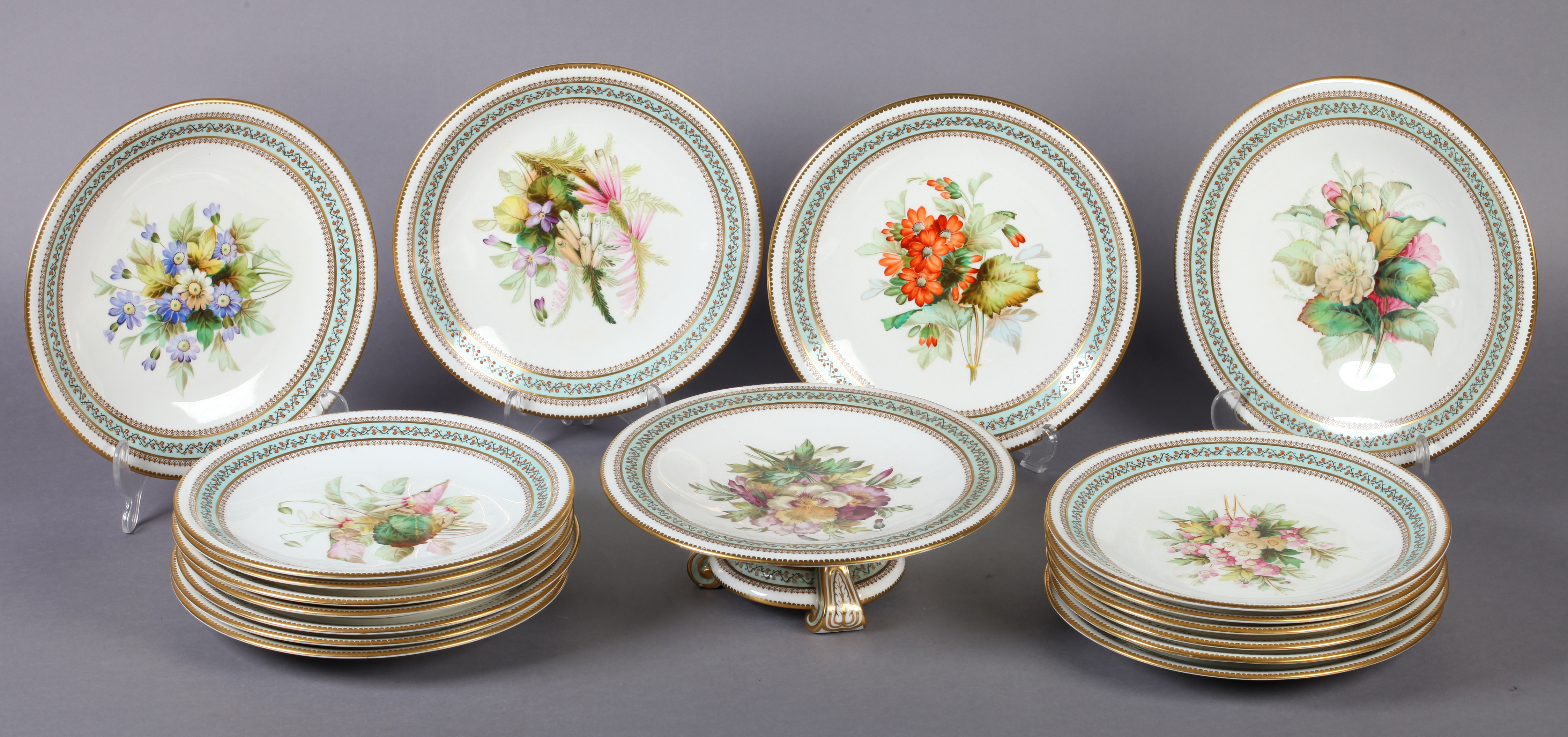 A ROYAL WORCESTER PART DESSERT SERVICE each piece hand painted with a botanical study of English