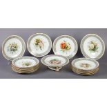 A ROYAL WORCESTER PART DESSERT SERVICE each piece hand painted with a botanical study of English