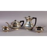 A GEORGE V THREE PIECE SILVER TEA SERVICE AND ASSOCIATED COFFEE POT, Birmingham 1912 and Sheffield