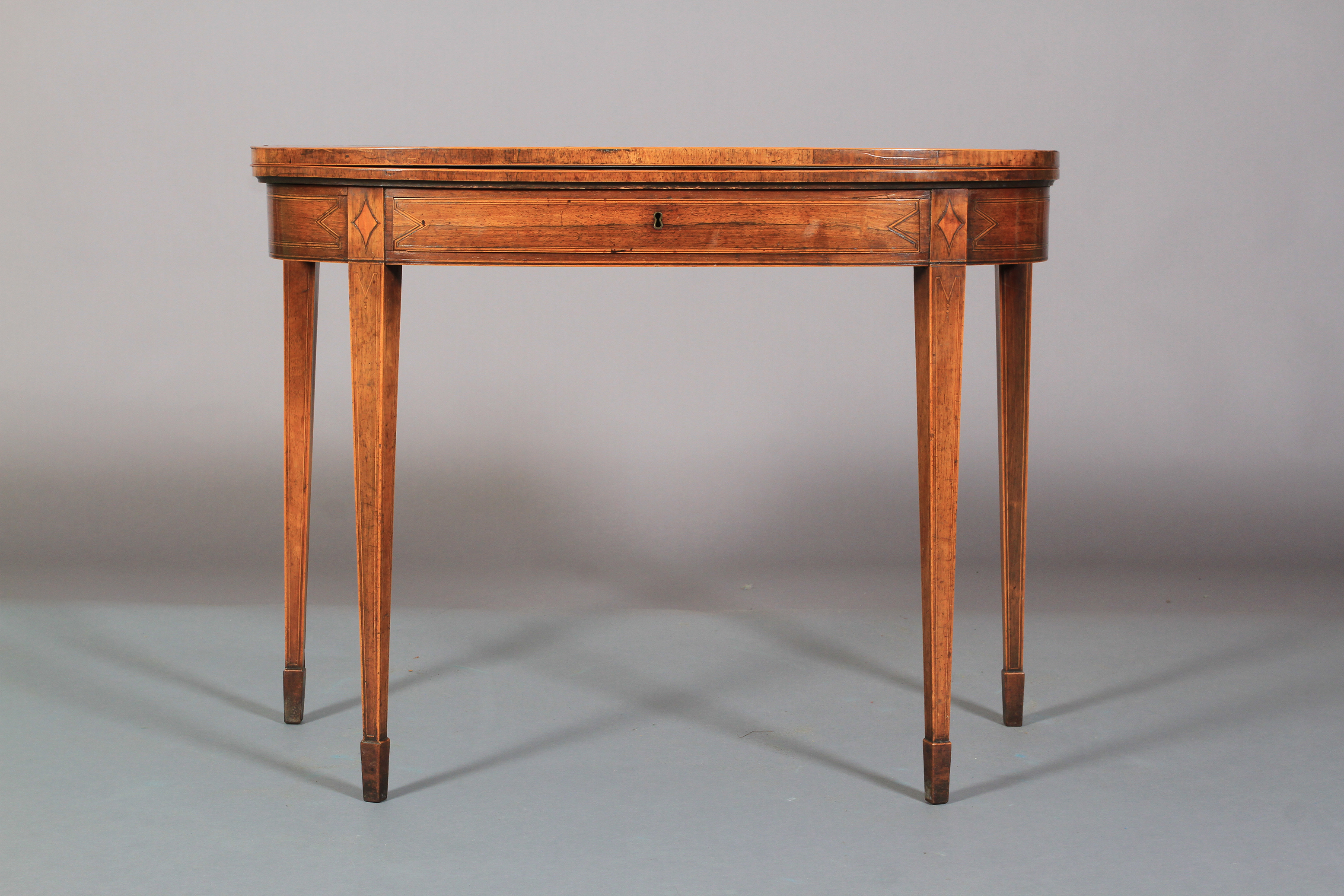 A GEORGE III ROSEWOOD AND SATINWOOD BANDED FOLD-OVER TEA TABLE of 'D' outline, line inlaid with - Image 3 of 6