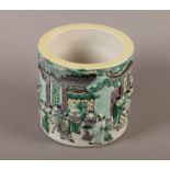 A CHINESE FAMILLE VERTE BRUSHPOT, in the Qing Dynasty style, of cylindrical form, the exterior