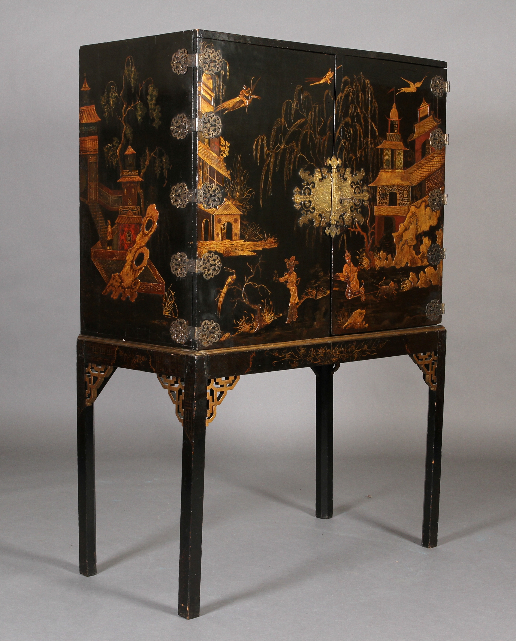 A CHINESE BLACK AND GILT LACQUERED CABINET ON STAND, 19th century, having two doors gilt with - Image 9 of 13