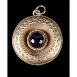 A VICTORIAN CARBUNCLE LOCKET in 14ct gold collet set to the centre with a circular cabochon garnet