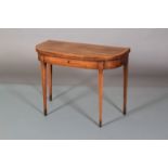 A GEORGE III ROSEWOOD AND SATINWOOD BANDED FOLD-OVER TEA TABLE of 'D' outline, line inlaid with