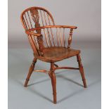 A 19TH CENTURY YEW WOOD LOW BACK WINDSOR ARMCHAIR, having a pierced splat and rail back, turned